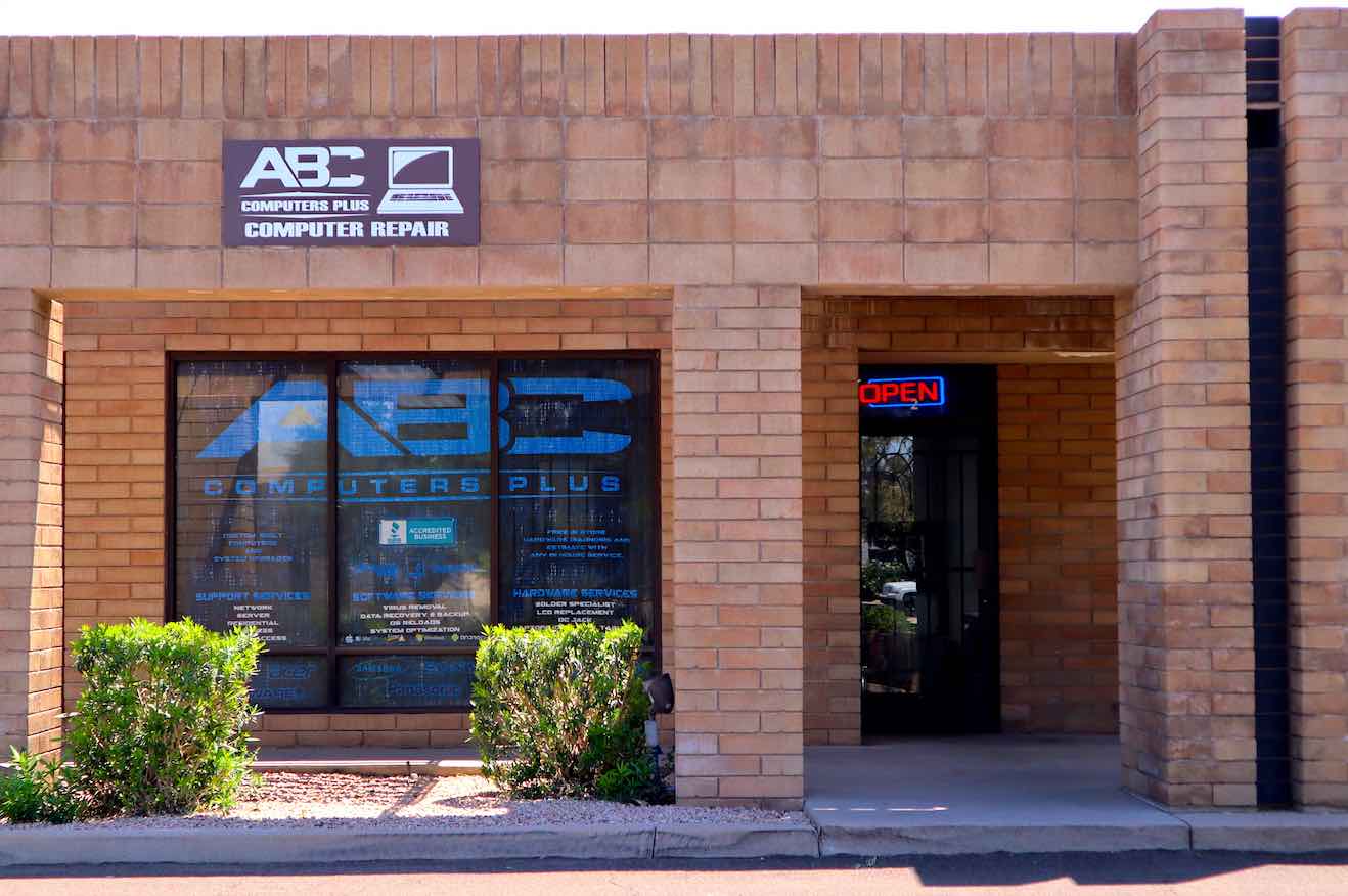 ABC Computer Plus store front at 2011 E 5th St